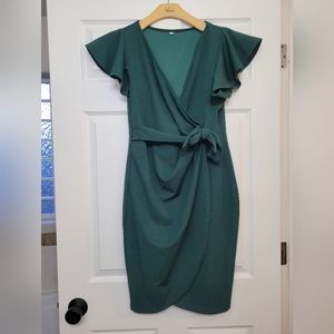Cute Emerald green dress with faux tie and ruching in the front